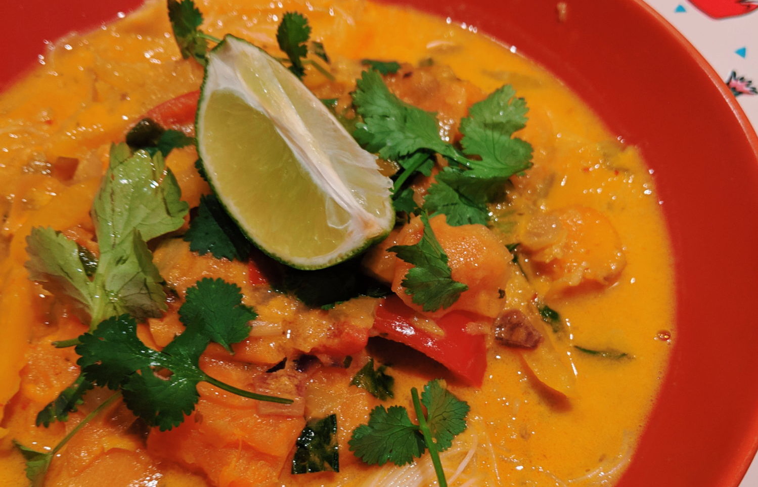 thai red curry noodle soup with lime